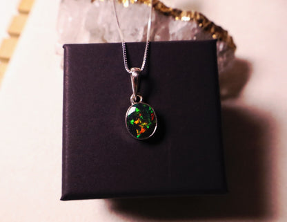 Oval Black opal Pendant with Adjustable chain 925 sterling.